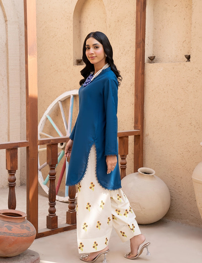 Blue top with white trouser